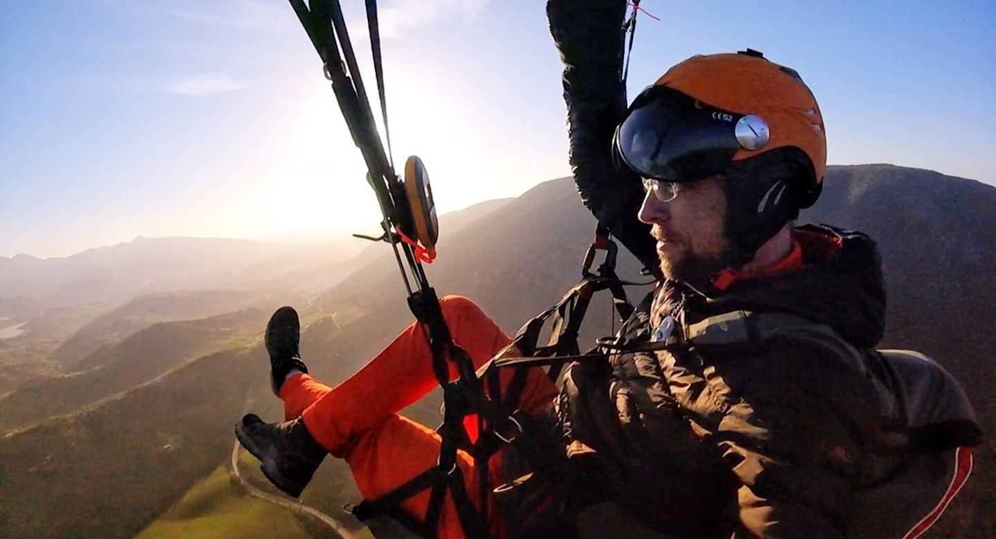 GoTo employee enjoying time paragliding.