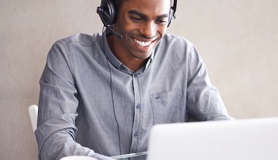 Man with headset using GoToConnect